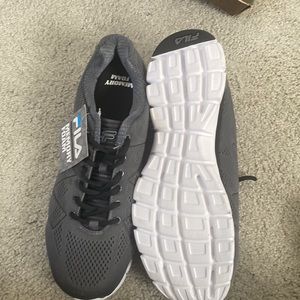 NWT men’s dark gray Fila sneakers with memory foam.